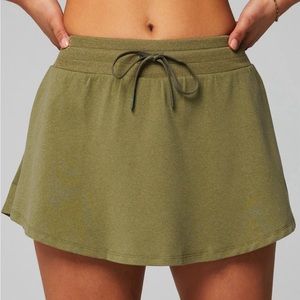 Fabletics cloud jersey Flounce skirt XS in dark moss heather. New with tags